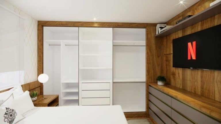 Quarto de casal com móveis planejados